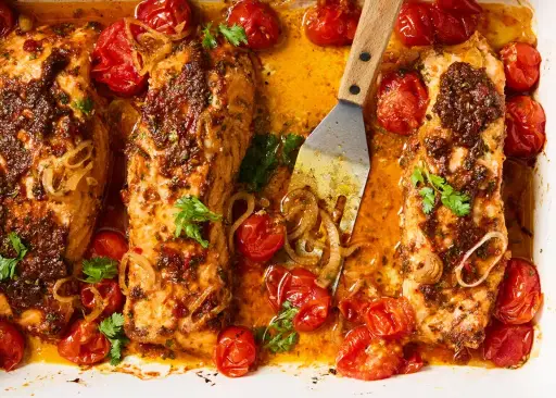 Baked Salmon With Harissa and Cherry Tomatoes and Polenta 